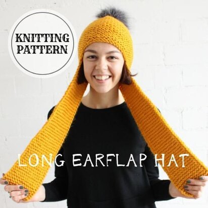 Long Earflap Hat with Faux Fur Pompom