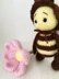 Bee amigurumi with flower