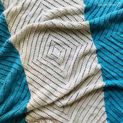 Geometric Eyelet Throw