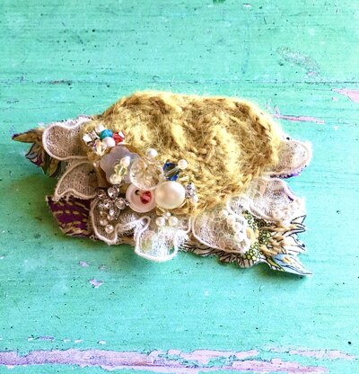 Another brooch
