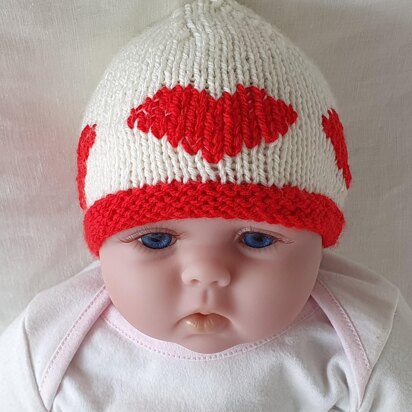 Kaley - Baby’s 8ply beanie with embroidered heart motifs