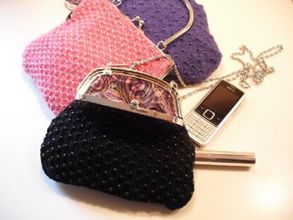 Beaded clutch and handled bags