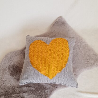 Grey and mustard cable heart cushion