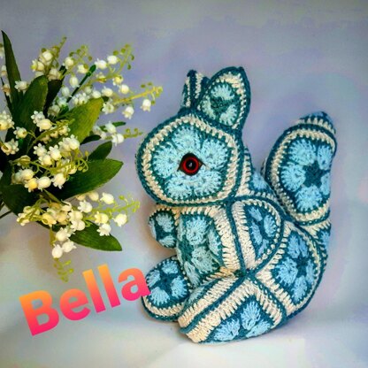 Bella the Squirrel with African Flowers