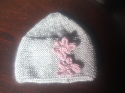 silver and pink hat