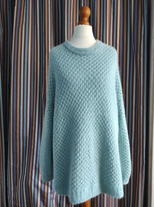 Instructions for Knitting a Blue Jumper with Mesh Pattern