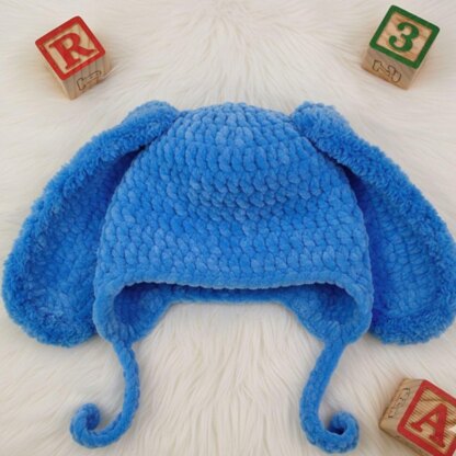 A warm crochet pattern set for newborns: bunny ear booties, a hat with long bunny ears, bunny rattle, crochet pattern kit for photo shoots