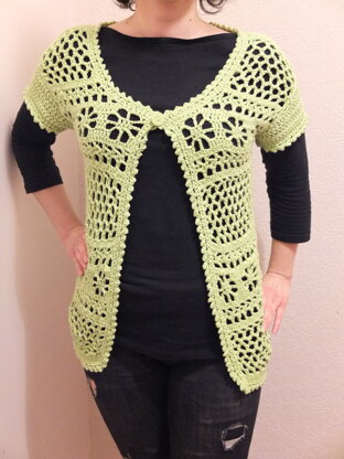 Crochet cardigan with polka dot button