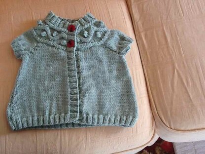 Evie's greenish cardy