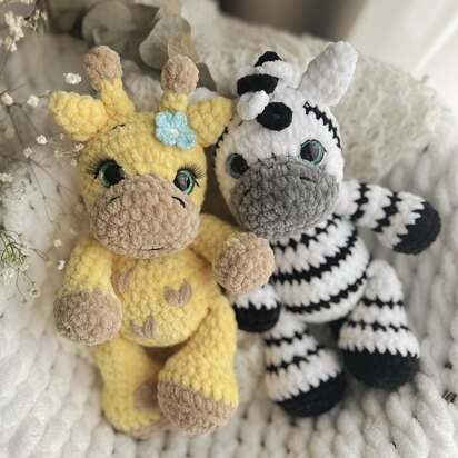 Giraffe and Zebra plush toys