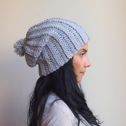 Slouchy hat with pom pom