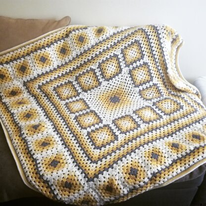 Yellow and grey throw