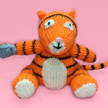 The Tiger Who Came To Tea orange cover / toy