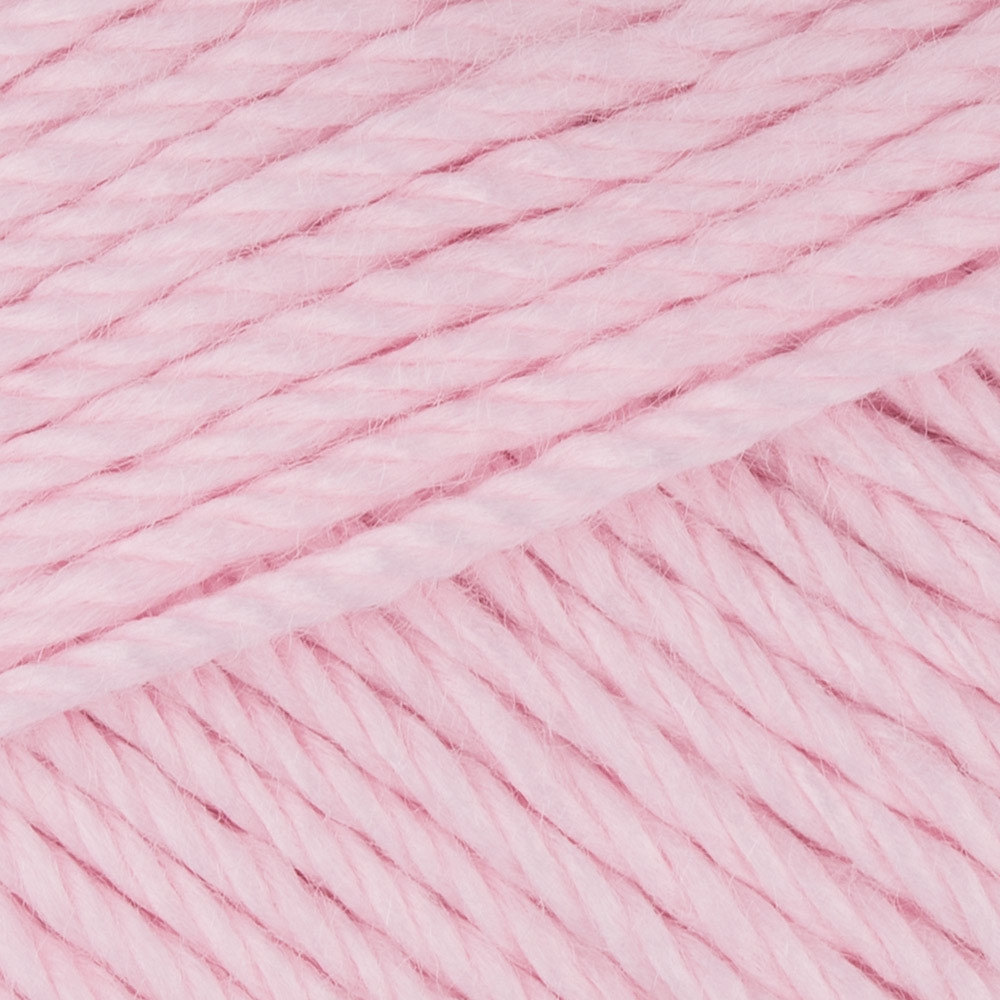 Women's hobby. Crochet and knitting. Yarns in basket on pink palka dot  background, crocheting supplies. Stock Photo