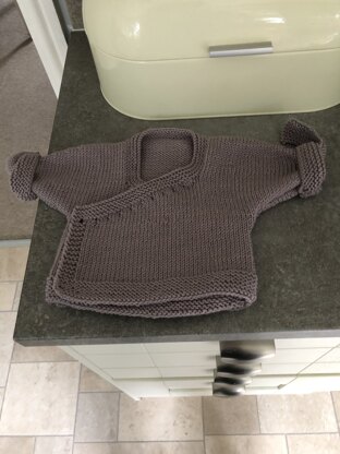 Swaddle Cardigan in MillaMia Naturally Soft Aran - Downloadable PDF