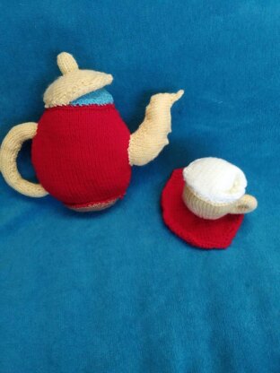 Knitted Teapot and a cup in a saucer ( Mrs. Potts and Chip)