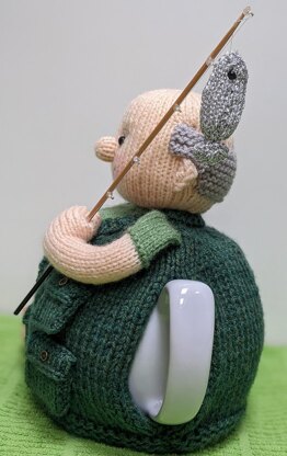 Monty goes fishing tea cosy