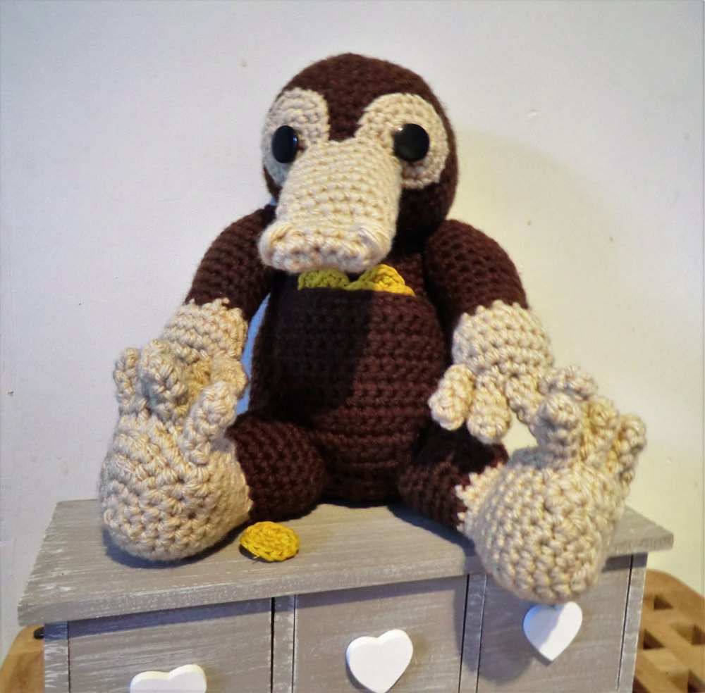 Niffler and coins Crochet pattern by Liz Ward | LoveCrafts