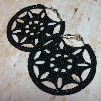 55. Hoop openwork earrings