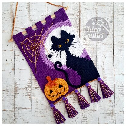 Black cat wall hanging