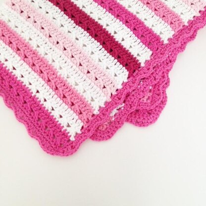 The Vanellope Crochet Baby Blanket is a free crochet pattern featuring Red  Heart Butte…