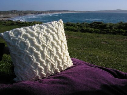 Cabled knitted cushions