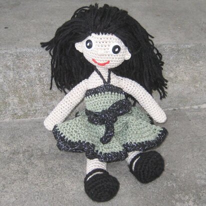 Crochet doll in olive green dress