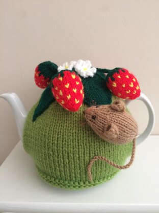 Nature tea cosy. Animal tea cosy .Pesky mouse in the strawberry patch