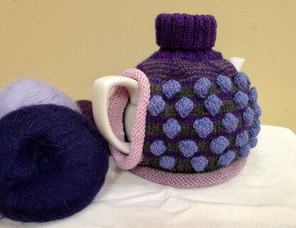 The colour Purple Tea Cosy