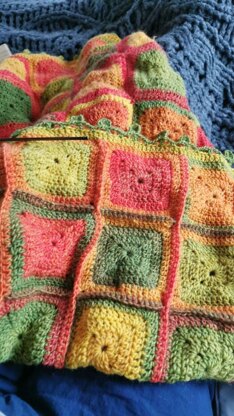 Energy Boosting Granny Square blanket in gradient ombre yarn