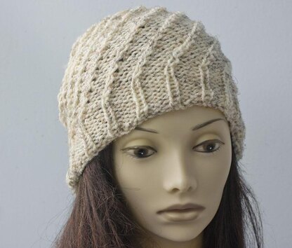 Knit Spiral Hat Knitting pattern by Judith Stalus | LoveCrafts