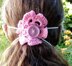 Crochet flower to hold facemask in place