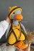 Knitting toy clothes for goose