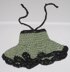 Crochet doll in olive green dress