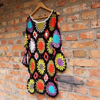 Crochet rainbow pullover.