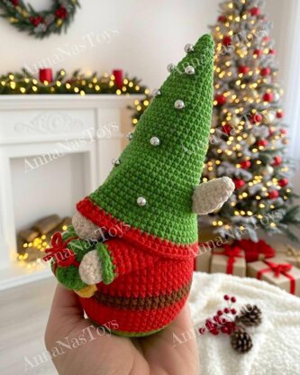 Сhristmas gnome Elf with a gift