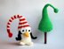 New Year Penguin in hat with Christmas tree