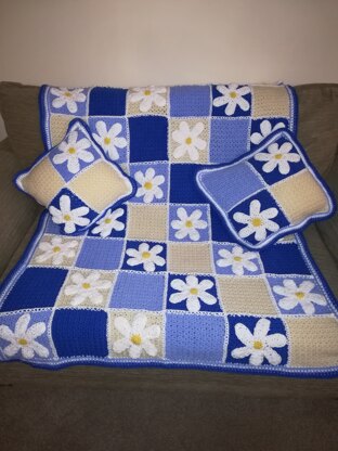 Sophie's Blue dazzle daisy throw and cushions