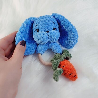 A warm crochet pattern set for newborns: bunny ear booties, a hat with long bunny ears, bunny rattle, crochet pattern kit for photo shoots