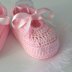 Pink baby shoes with bow