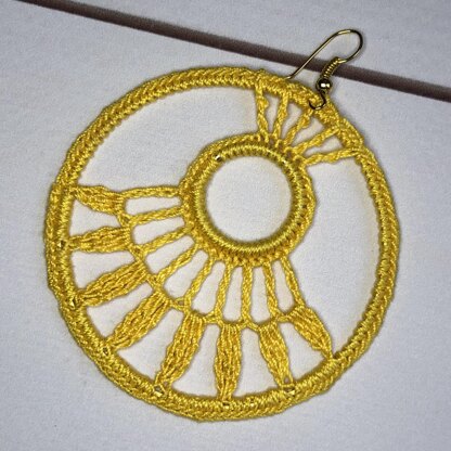 44. Sun symbol earrings