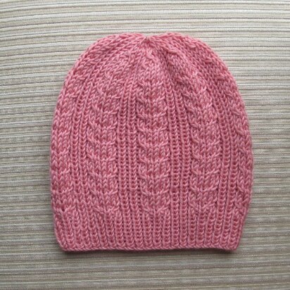 Hat with Ribbing and Braids for a Lady - knitting pattern
