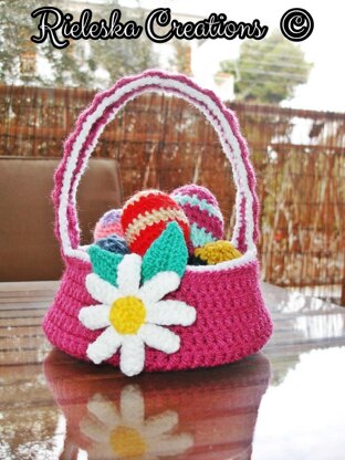 Easter flower basket and coloured easter eggs