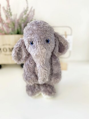 Cute stuffed elephant in a hat