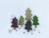 Many Christmas trees knitted flat