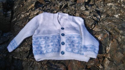 Two baby fairisle cardigans with boats and hearts
