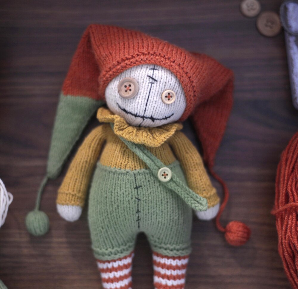 Knitted clown sales doll