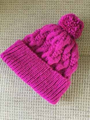 Modern Cable Hat - Free Knitting Pattern for Women in Paintbox Yarns Simply Aran by Paintbox Yarns