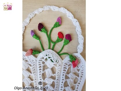 Crochet basket with a bouquet of flowers