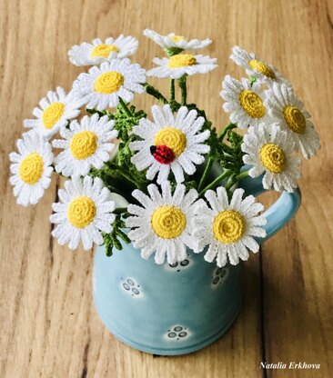 Chamomile flower and ladybug